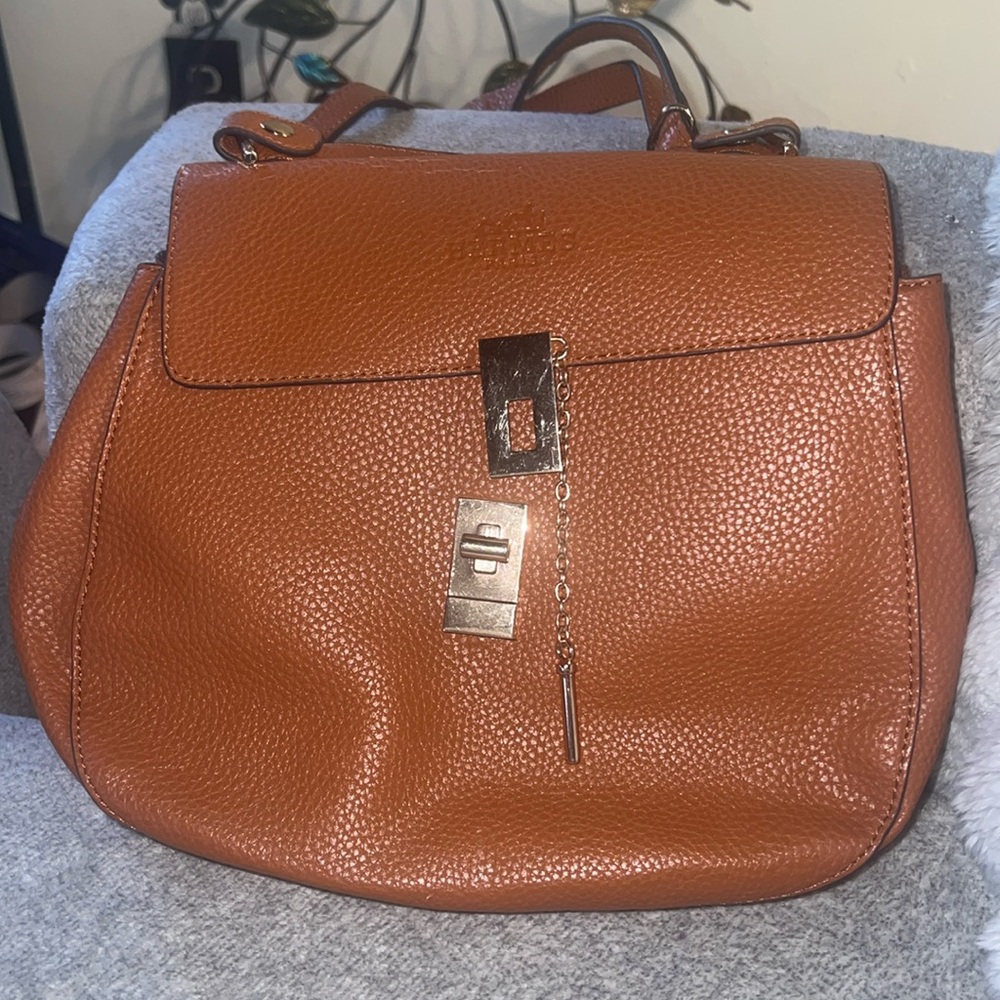 Used medium shoulder bag slightly damaged brown